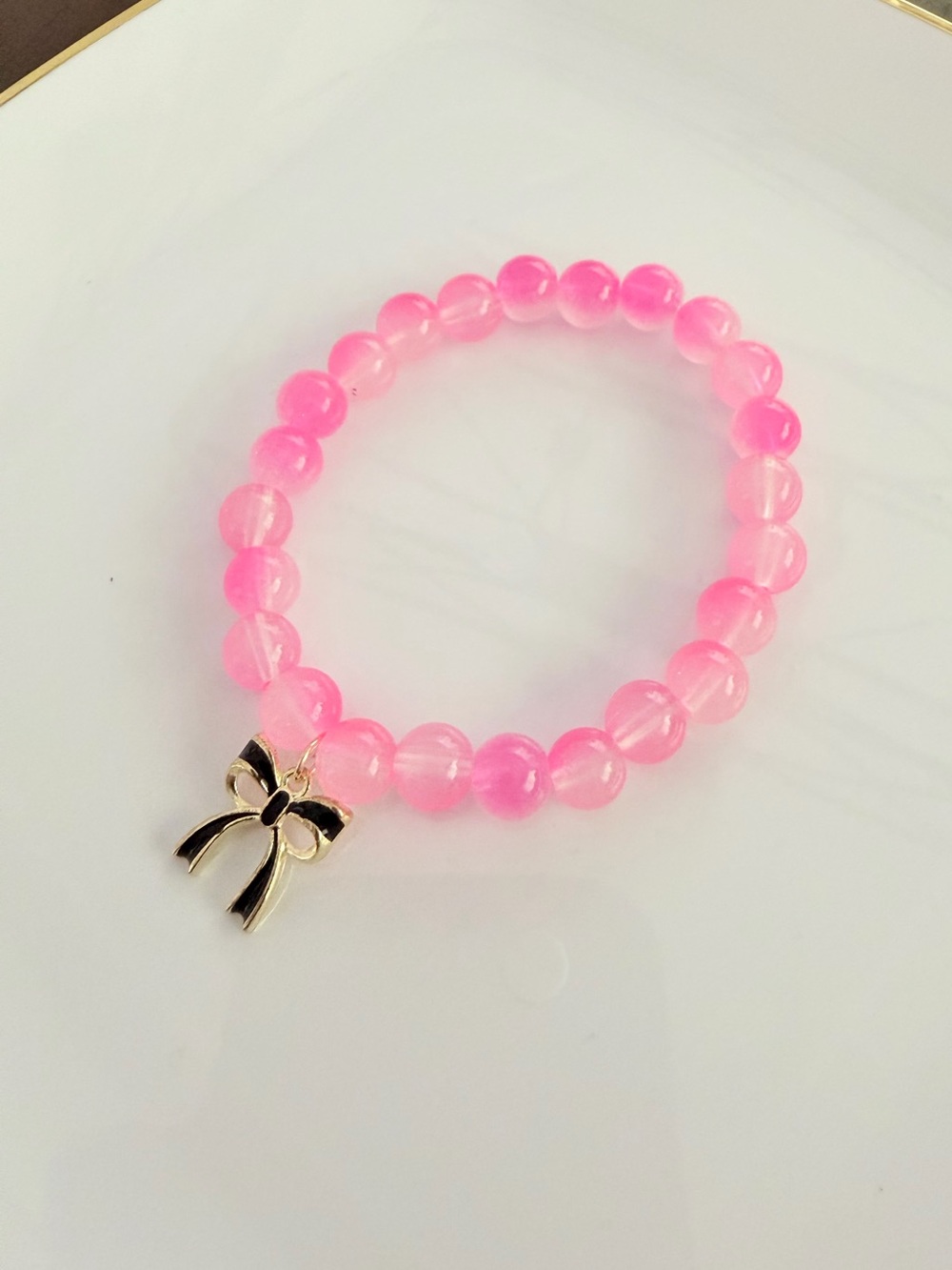 Delicate Pink Beaded Bracelet with Gold Bow Charm